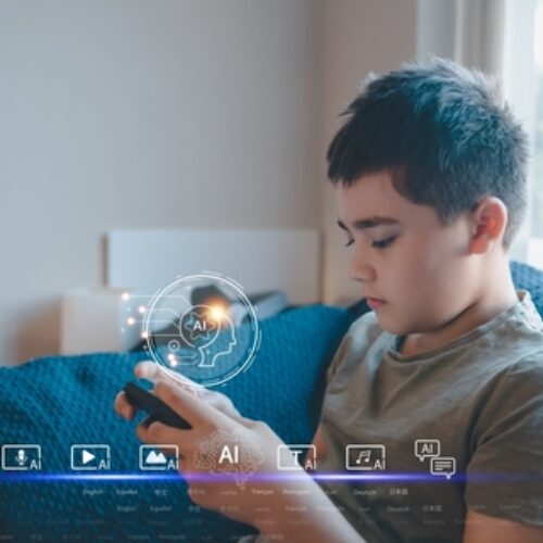 Kid,Boy,Learning,Multiple,Languages,With,Ai,On,Smartphone.,Concept